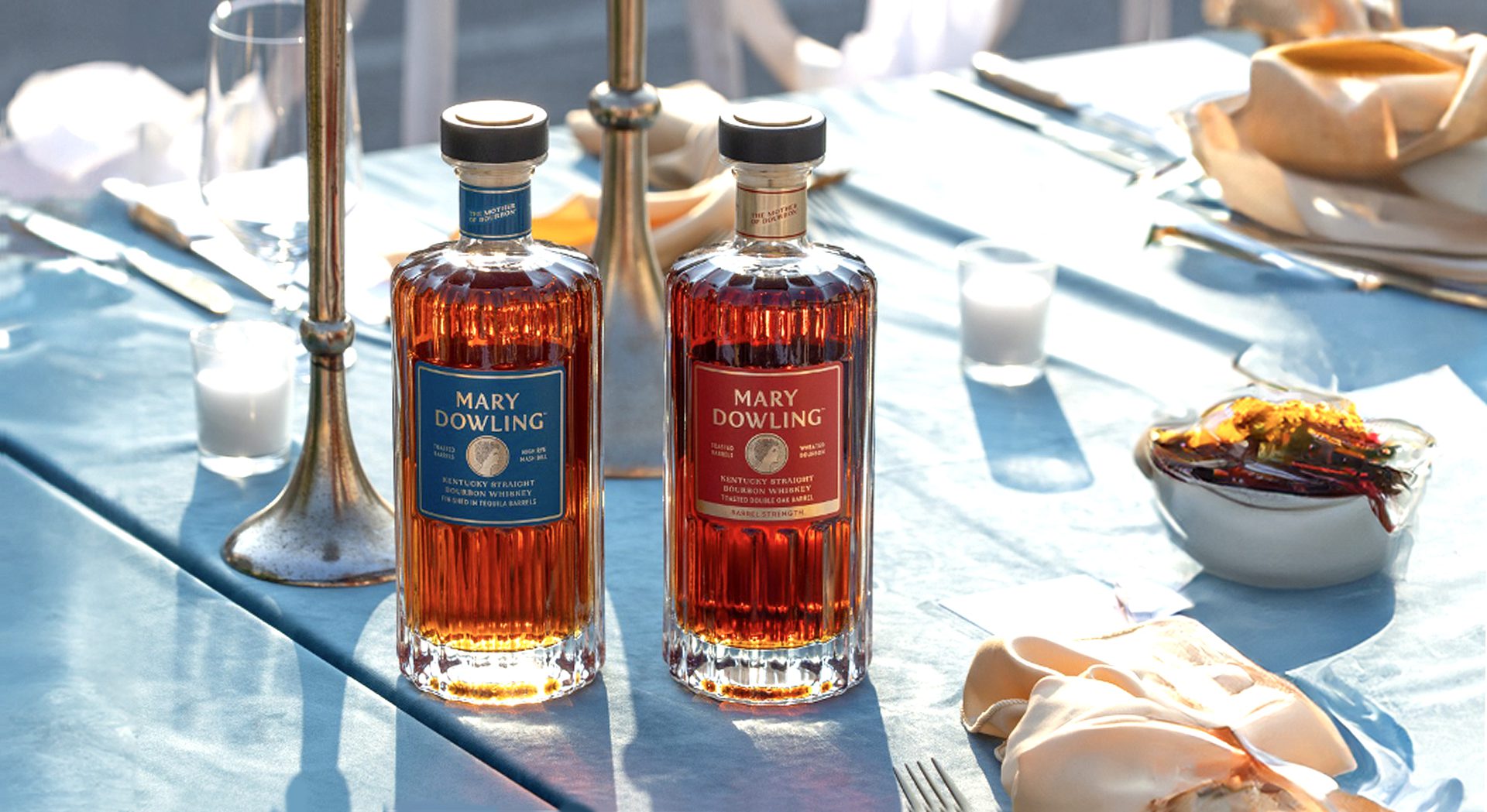 Two bottles of Mary Dowling on a table