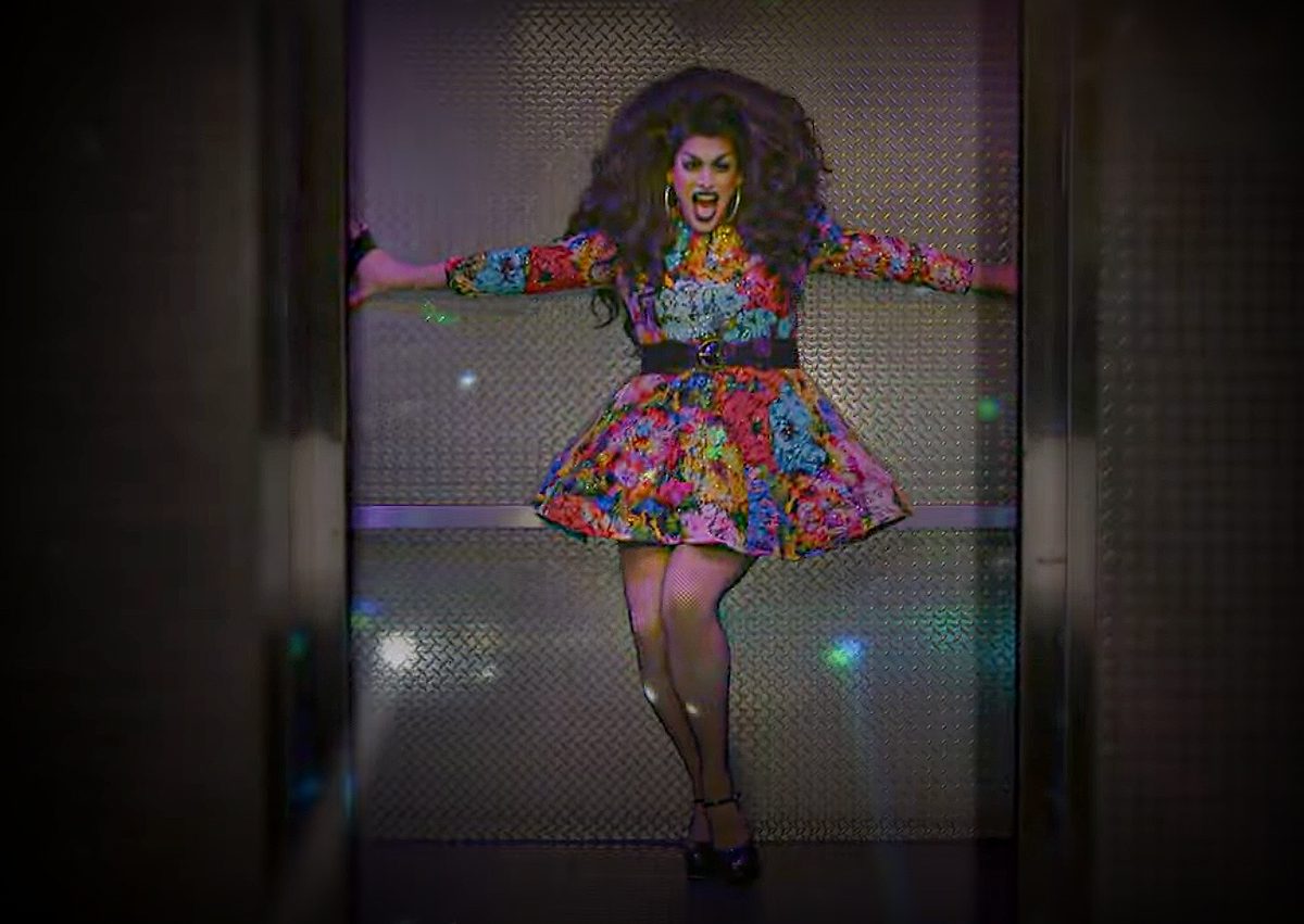 Dusty Bottoms the drag performer leaving an elevator.